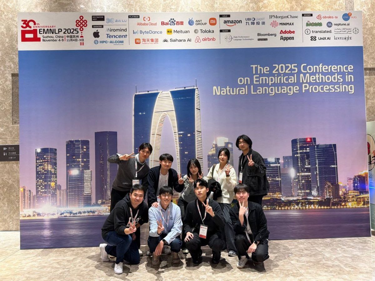 IIPL members in front of the EMNLP 2025 backdrop in Suzhou