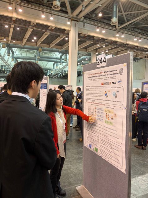 A lab member presenting a poster at EMNLP 2025